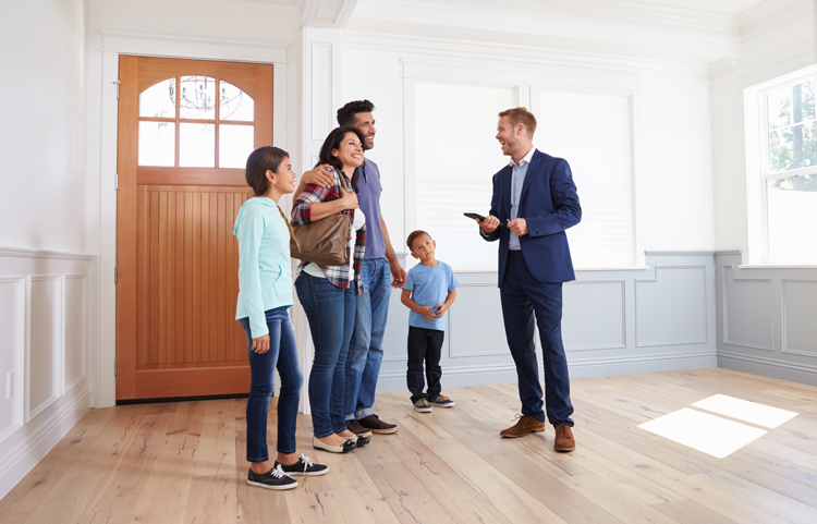 A family at a house viewing